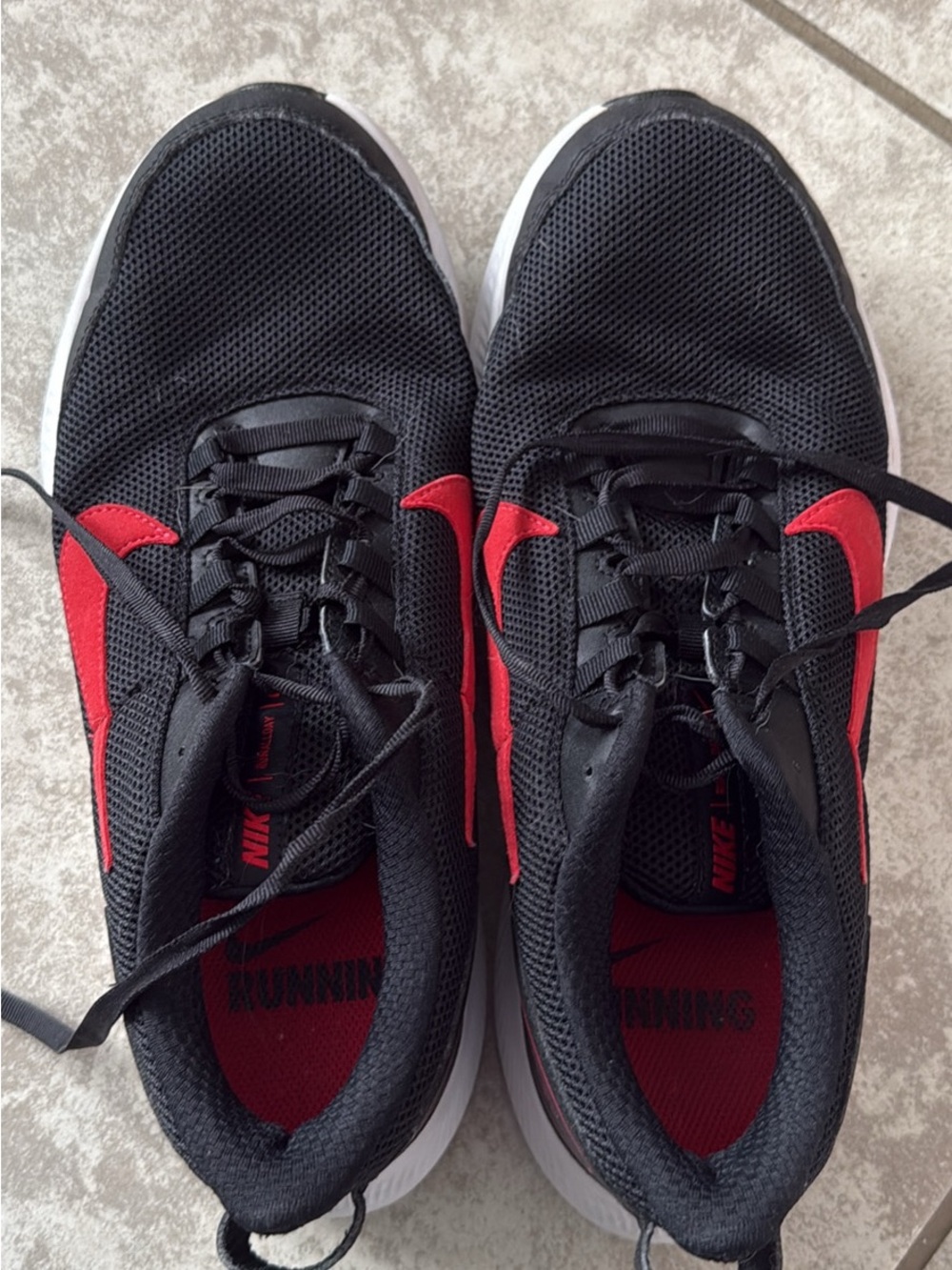 Nike Men’s Black Athletic Shoes with Red Swoosh